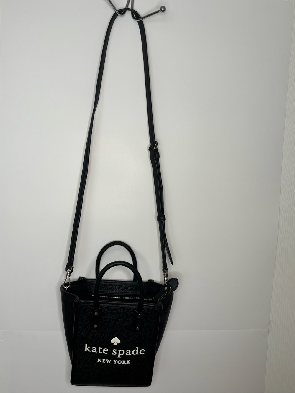 kate spade Black Pebbled Leather Small Crossbody Tote
Removable strap